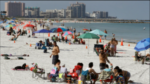 Cones are set up to help beachgoers keep a safe distance from one another after Clearwater Beach officially reopened to the public Monday in Clearwater Beach, Fla. (Chris O'Meara/AP)